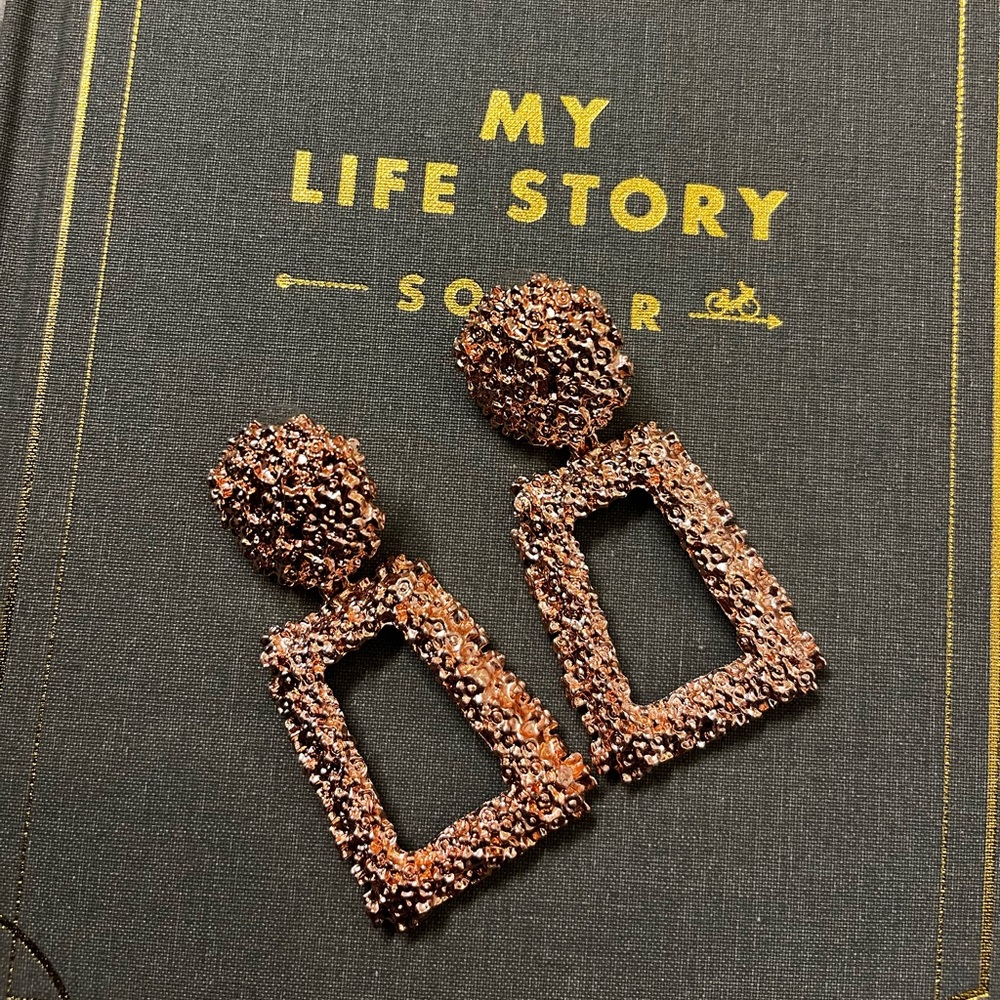 Rose gold earrings worn 1x